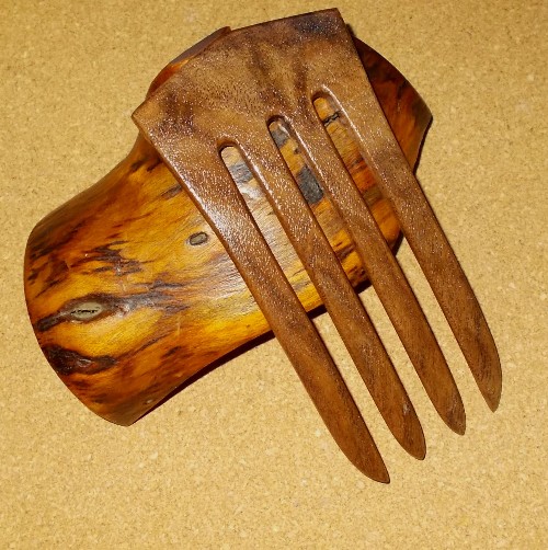 Figured walnut 4 prong hair fork by Jeter and sold in the UK by Longhaired Jewels